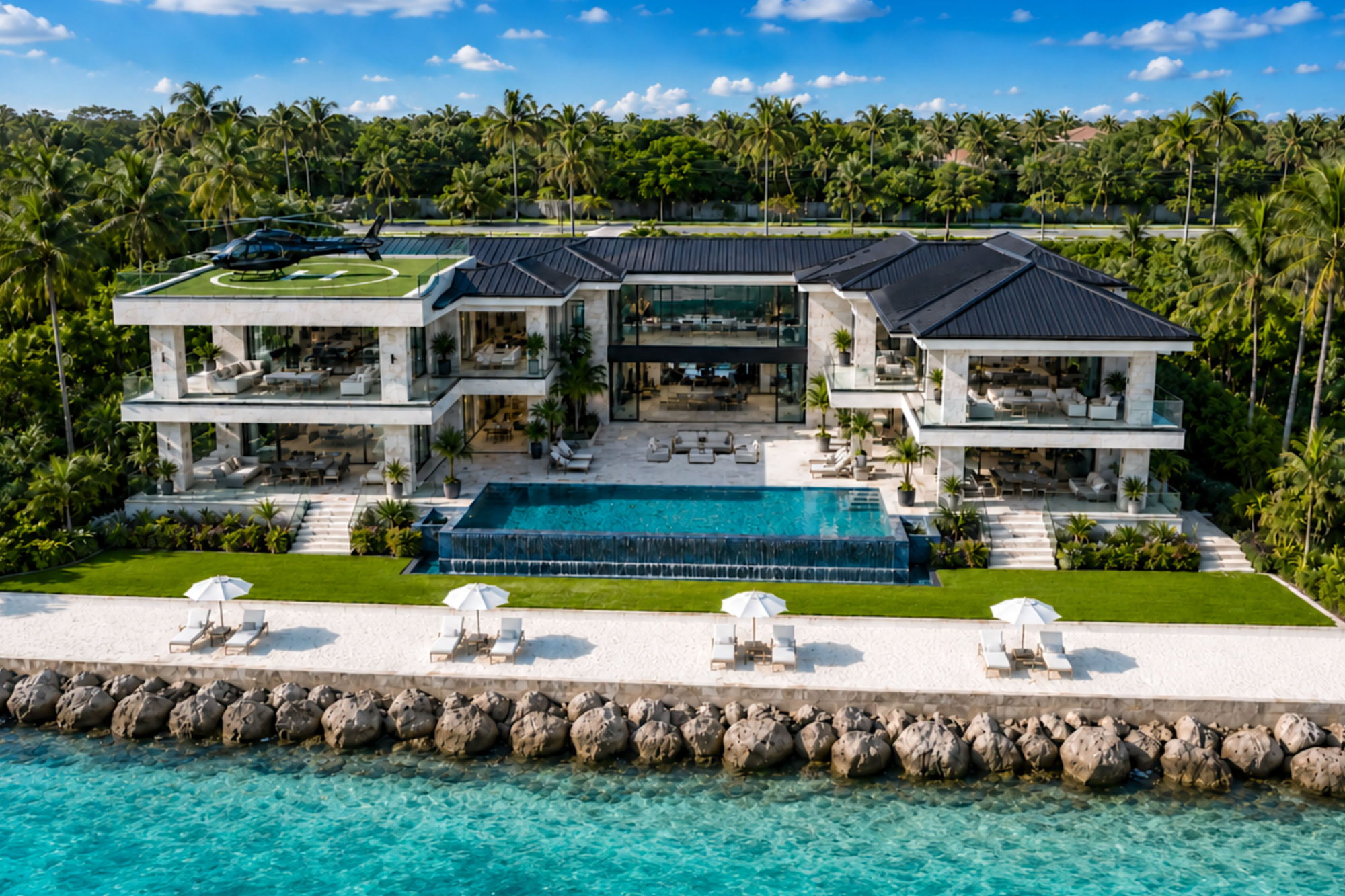 4110 Higel Avenue rear elevation — waterfront pool terrace and rooftop helipad